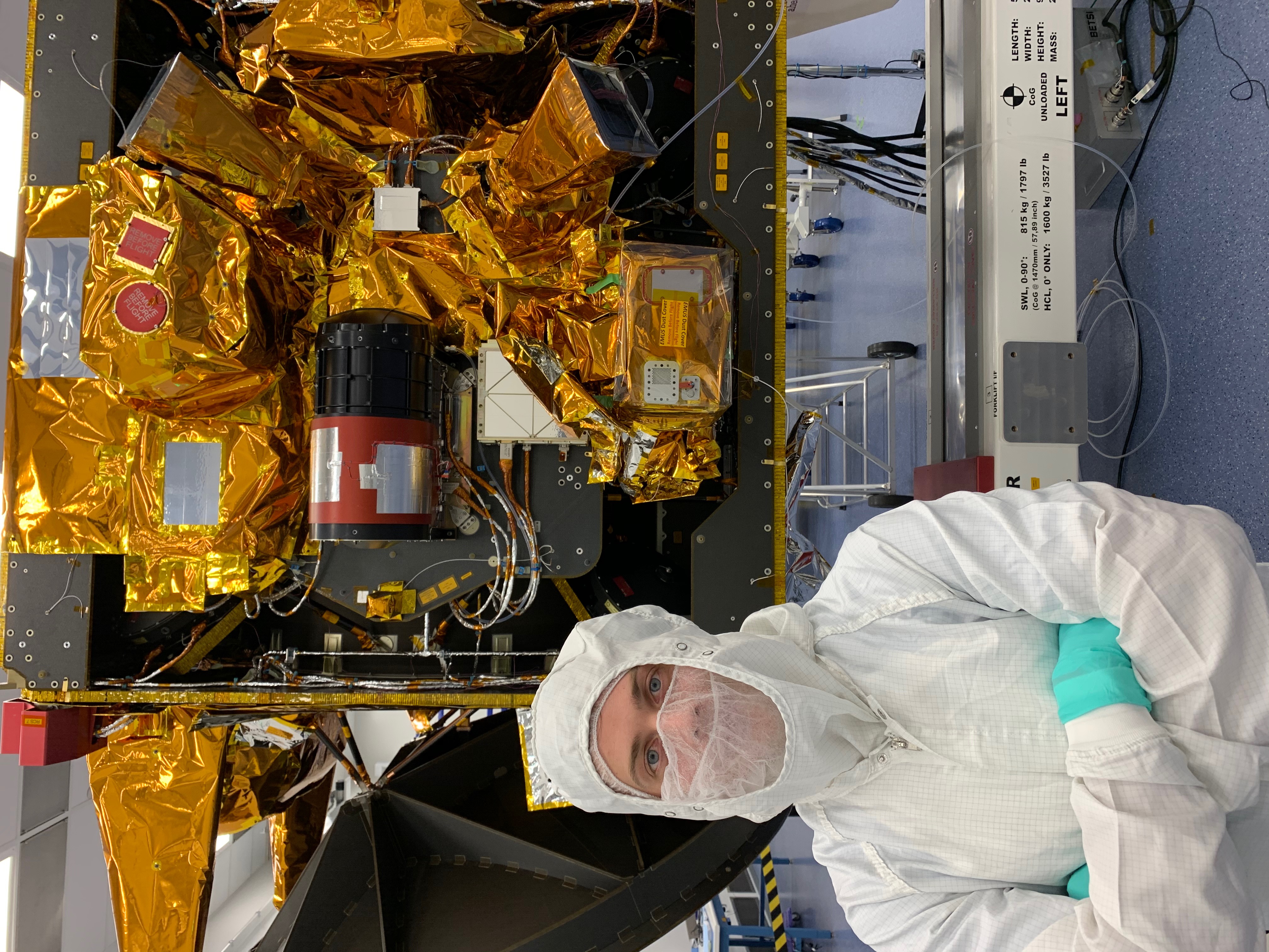 John Janiczek working on spacecraft hardware