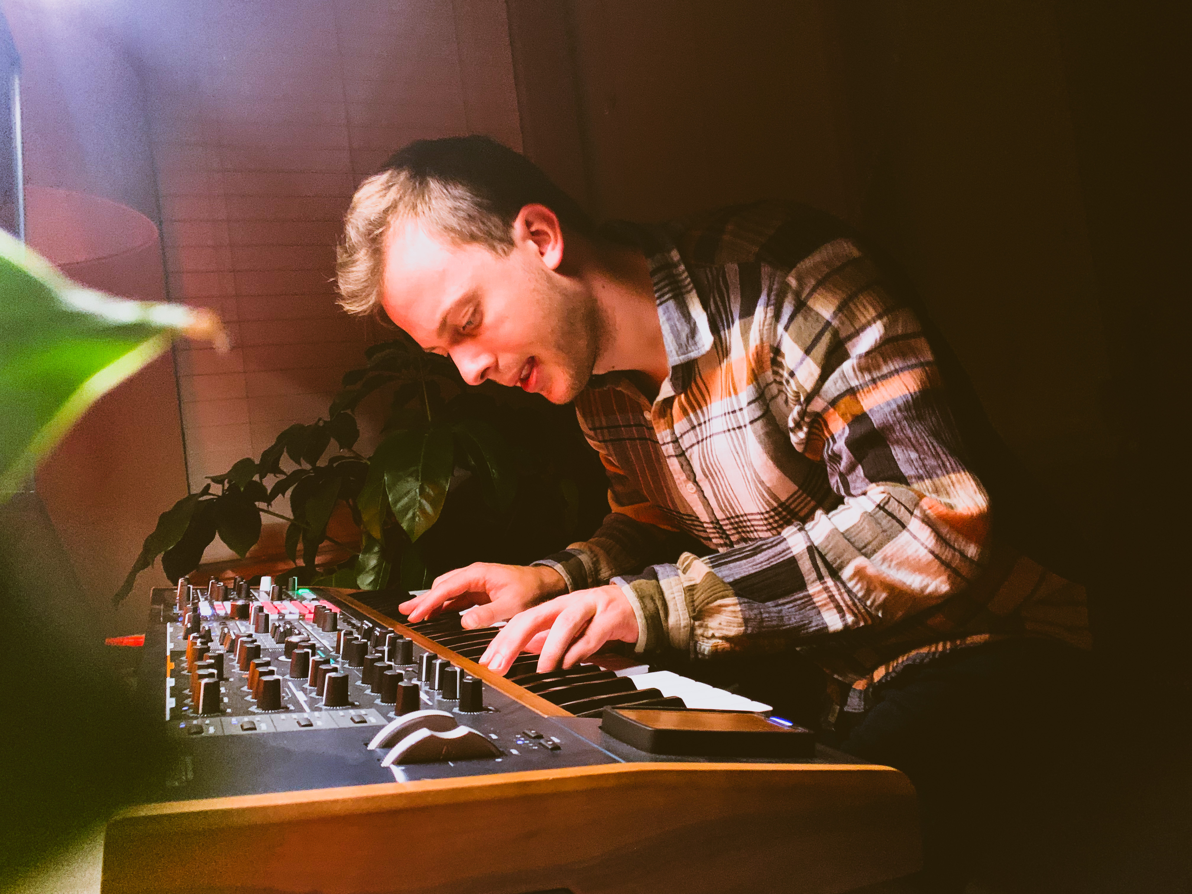John Janiczek playing synthesizer